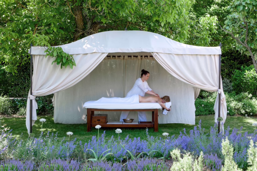 Garden massage at Borgo Santo Pietro spa in Tuscany, Italy