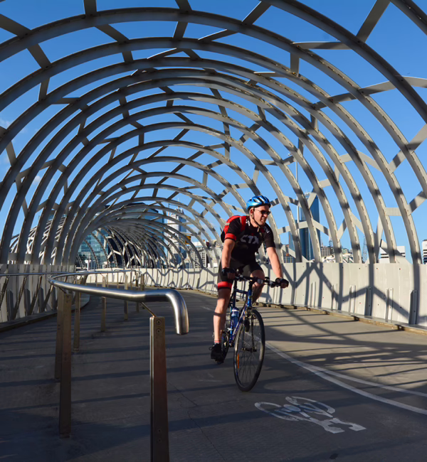 Cycling across Webb Bridge (Photo: ChameleonsEye / Shutterstock.com)