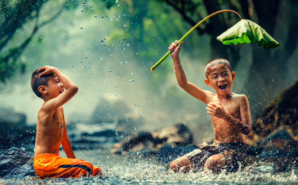 Children playing in the river in Cambodia