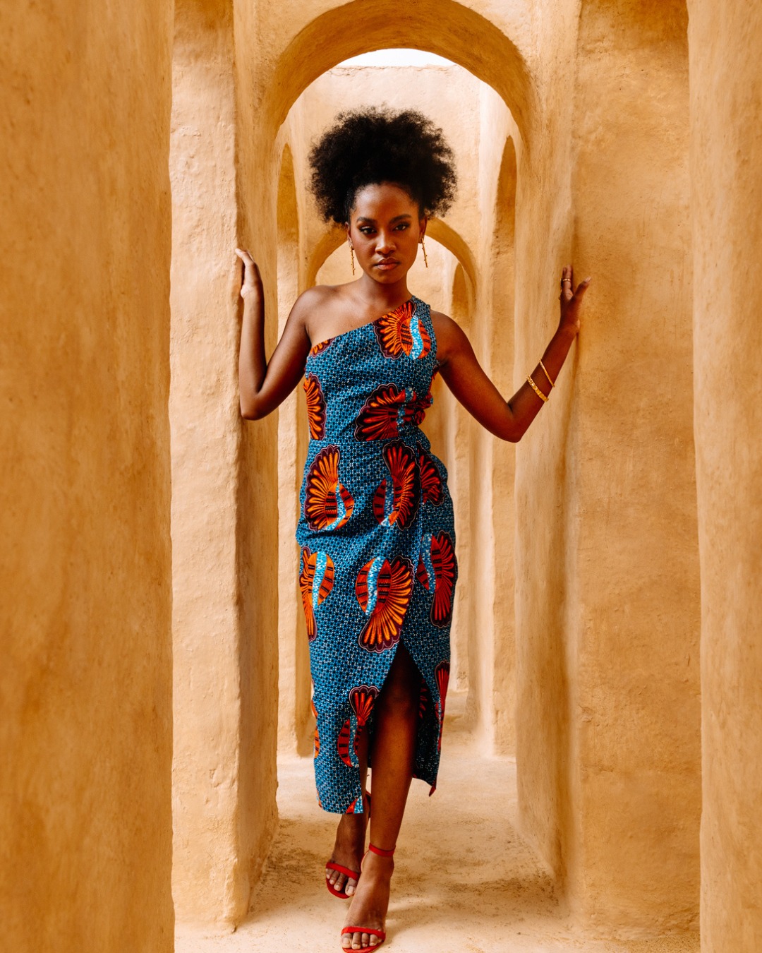 Model wearing African print dress