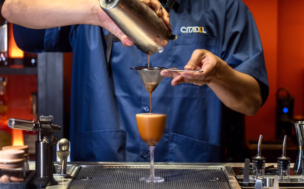 bartender making an espresso martini drink