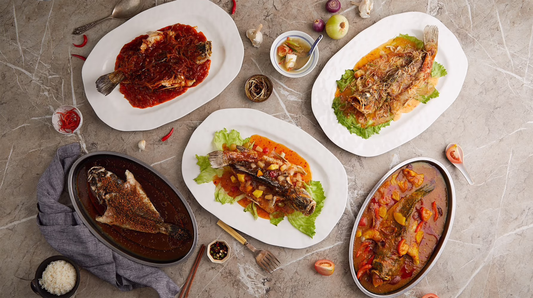 Assorted fish dishes served at Mellben Seafood in Singapore