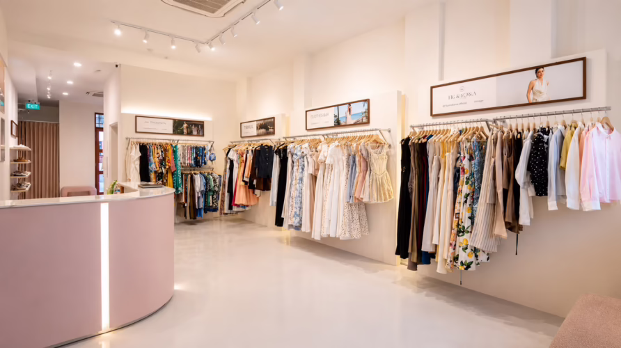 Fashion garments displayed inside With Love’s boutique space in Singapore