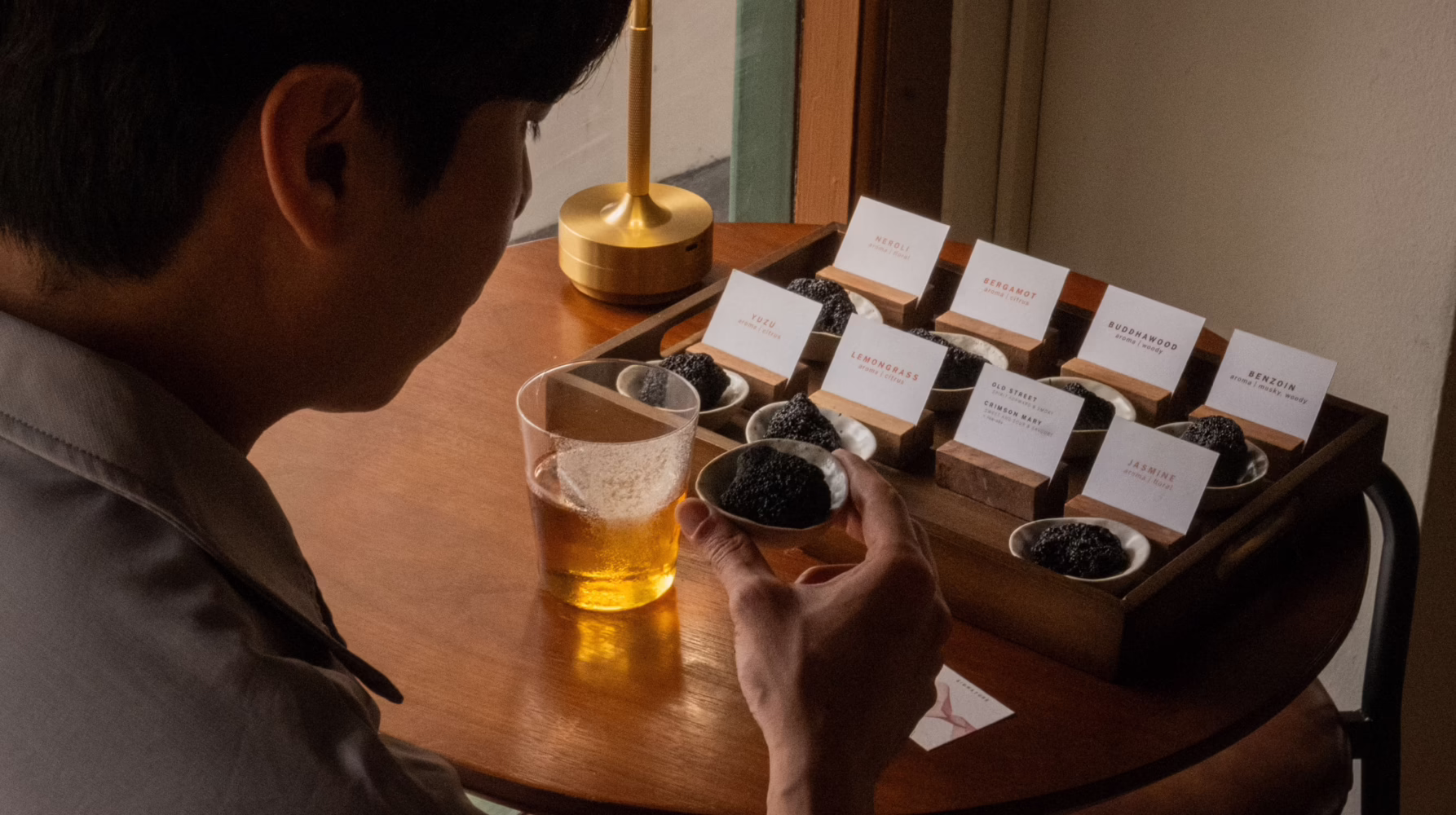 Close-up of Lunì’s scent experience using aroma-infused volcanic stones.