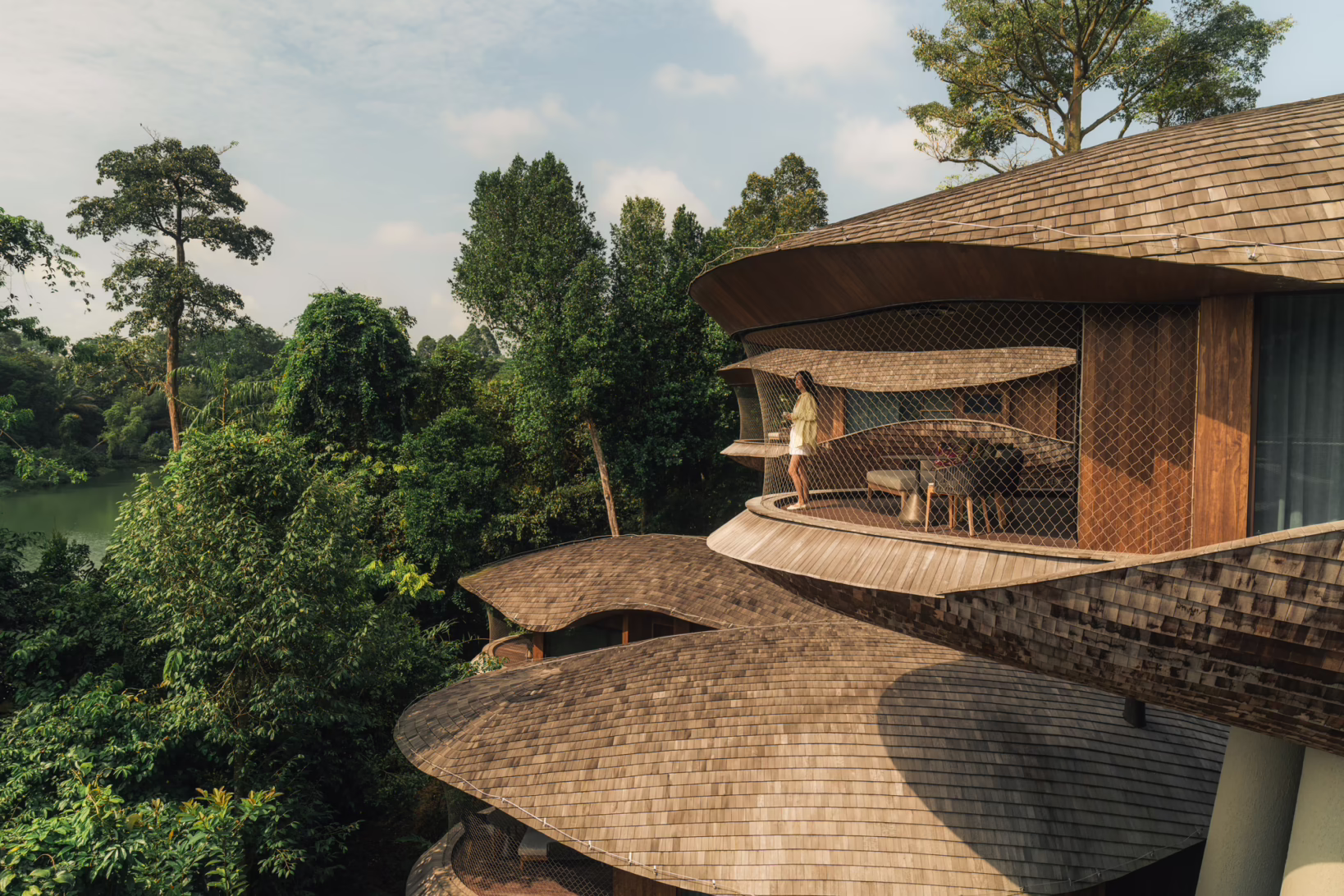 Nature-inspired resort surrounded by lush rainforest greenery at Mandai Rainforest Resort by Banyan Tree