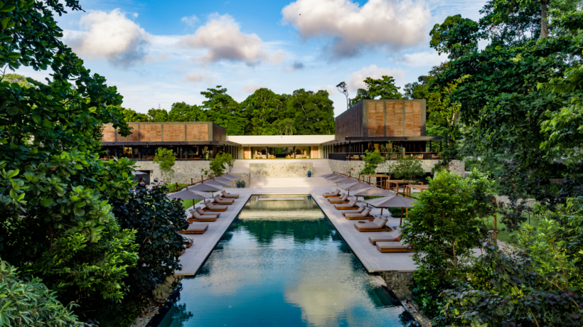 Beachfront resort surrounded by tropical greenery at Mandarin Oriental, Desaru Coast