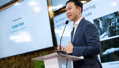 Photo Caption_ Colin Peh speaks on the human impact of clean energy innovation, sharing GoRental SG’s work across communities in Asia