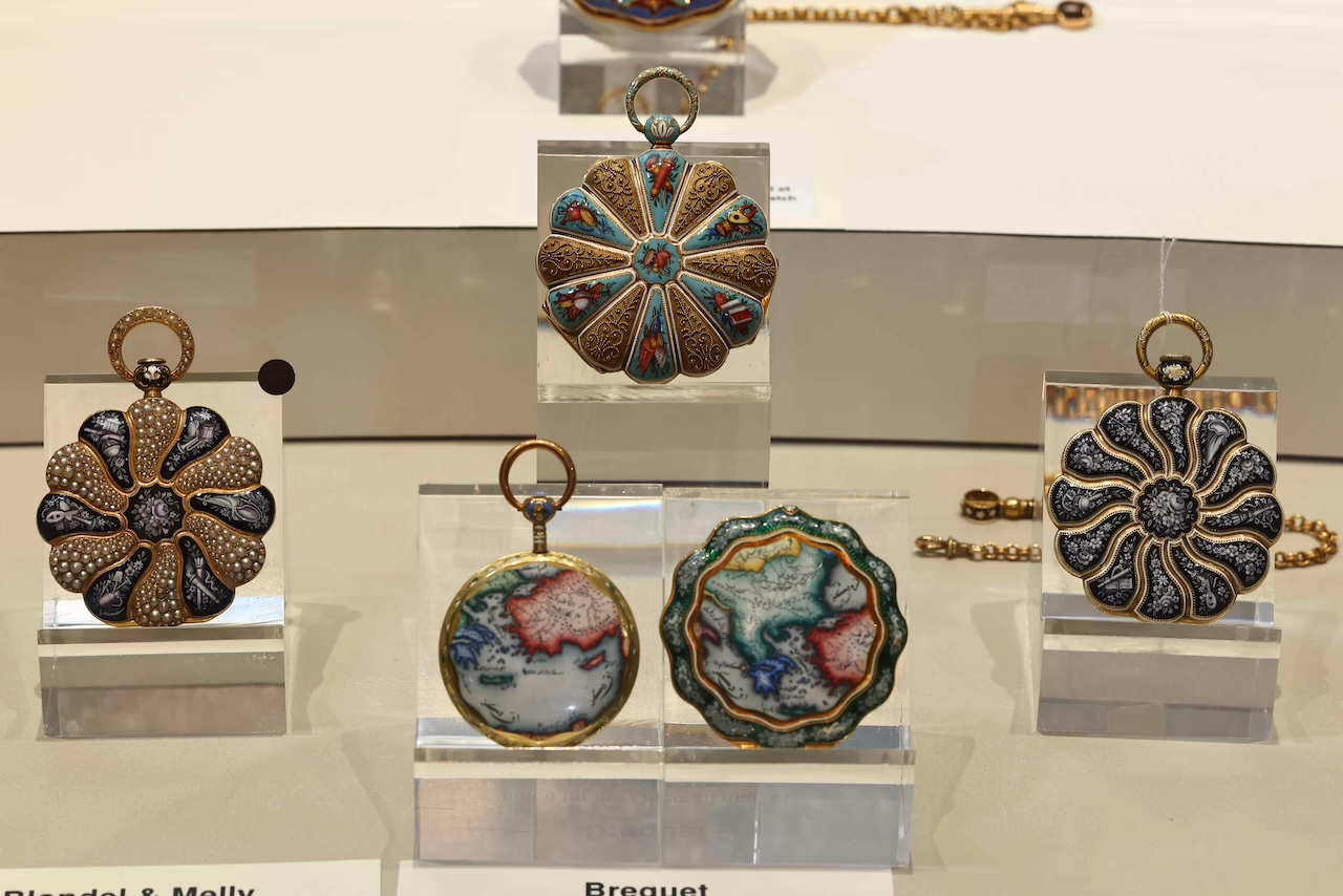 Rare enamel pocket watches on display at FutureGrail Museum