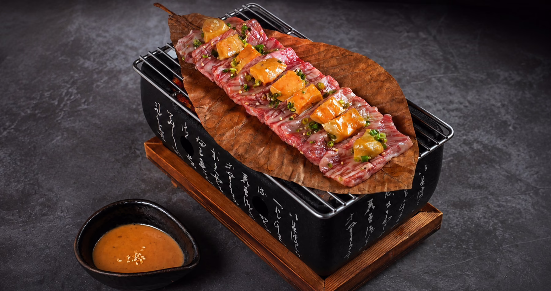 Wagyu A5 beef and Foie Gras in grilled Hobayaki leaf Kinka Sushi Bar Izakaya