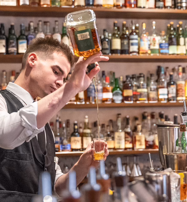 Cocktail service at Old Crow Bar in Zurich.