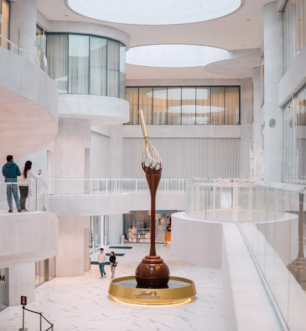 A large chocolate fountain inside Lindt Home of Chocolate in Zurich.