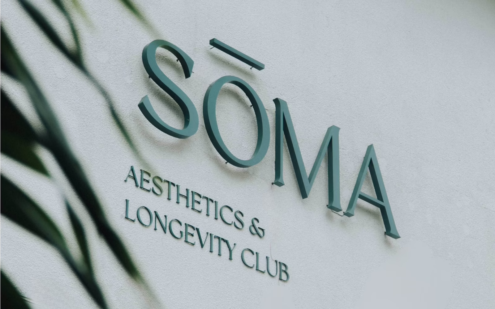 SŌMA Aesthetics & Longevity Club signage outside its Uluwatu clinic in Bali.