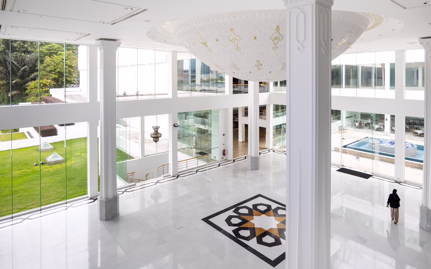 Interior of the Islamic Arts Museum Malaysia in Kuala Lumpur, featuring Islamic architectural details and displays
