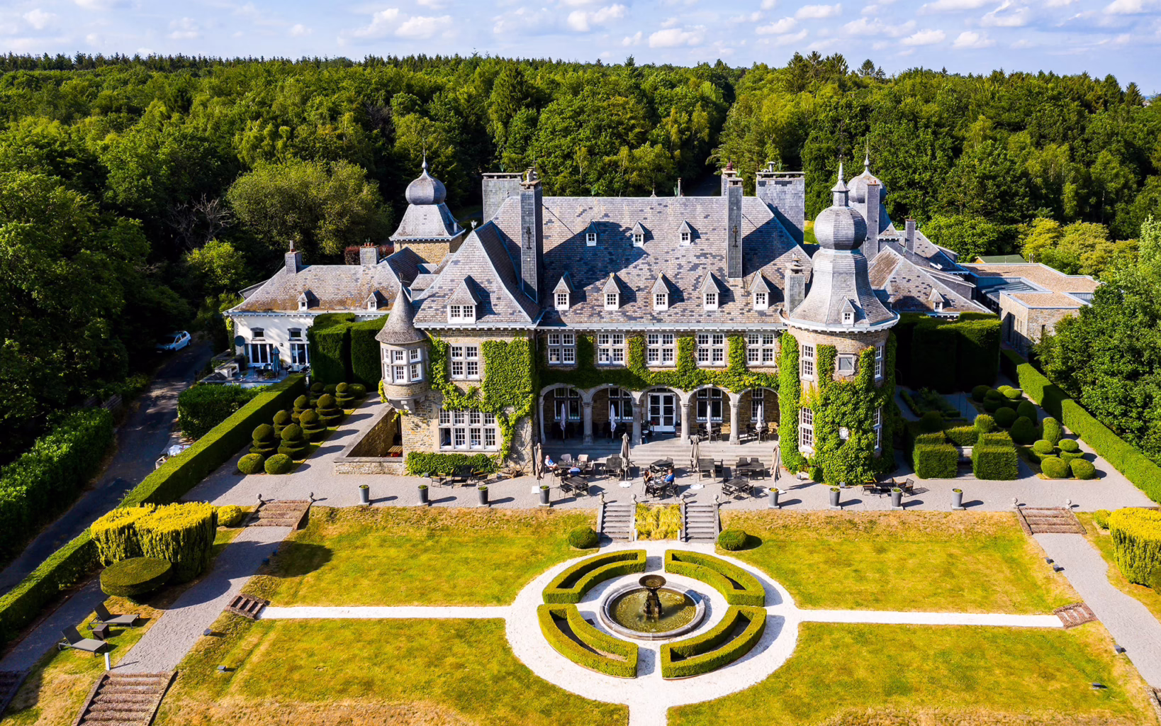 Manoir de Lébioles surrounded by greenery in the Belgian Ardennes near Spa, Belgium
