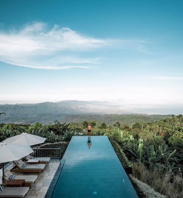 Infinity pool at Munduk Moding Plantation Nature Resort overlooking the mountains and Java Sea in North Bali