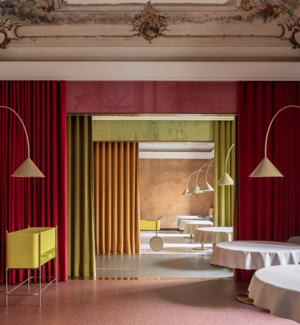 Pink-toned dining room and furnishings at Contraste restaurant in Milan