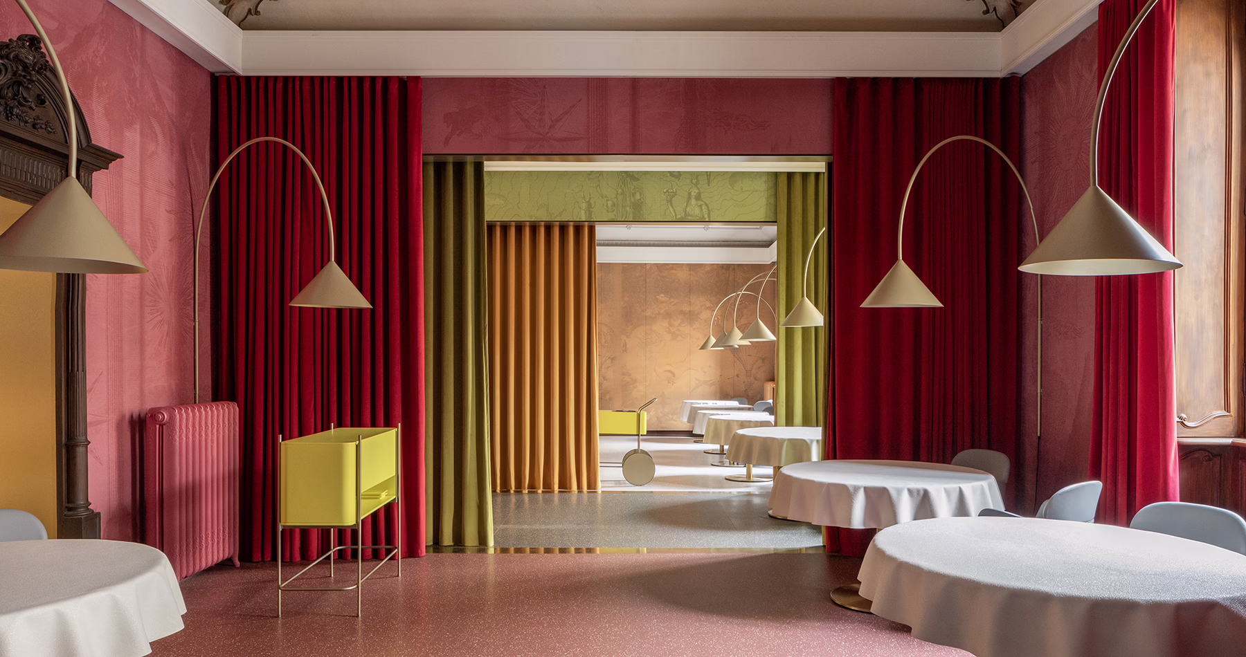 Pink-toned dining room and furnishings at Contraste restaurant in Milan