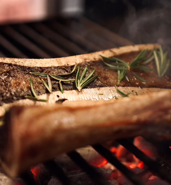 Grilled bone marrow served at Trippa Trattoria in Milan.