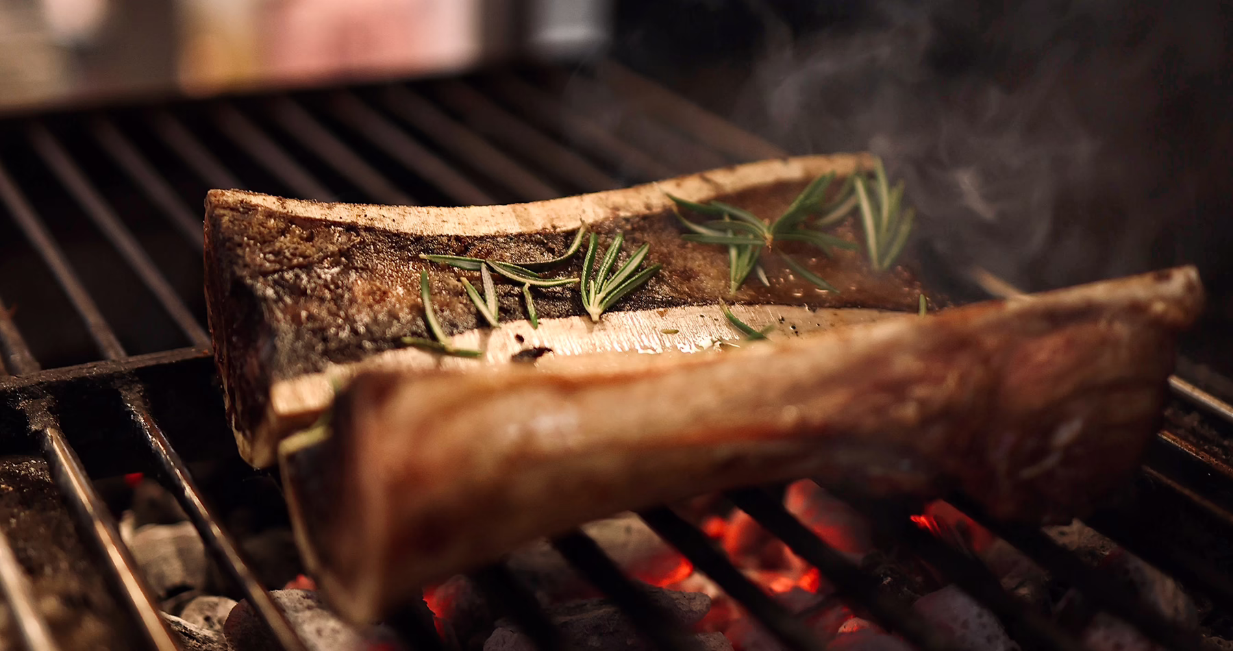 Grilled bone marrow served at Trippa Trattoria in Milan.