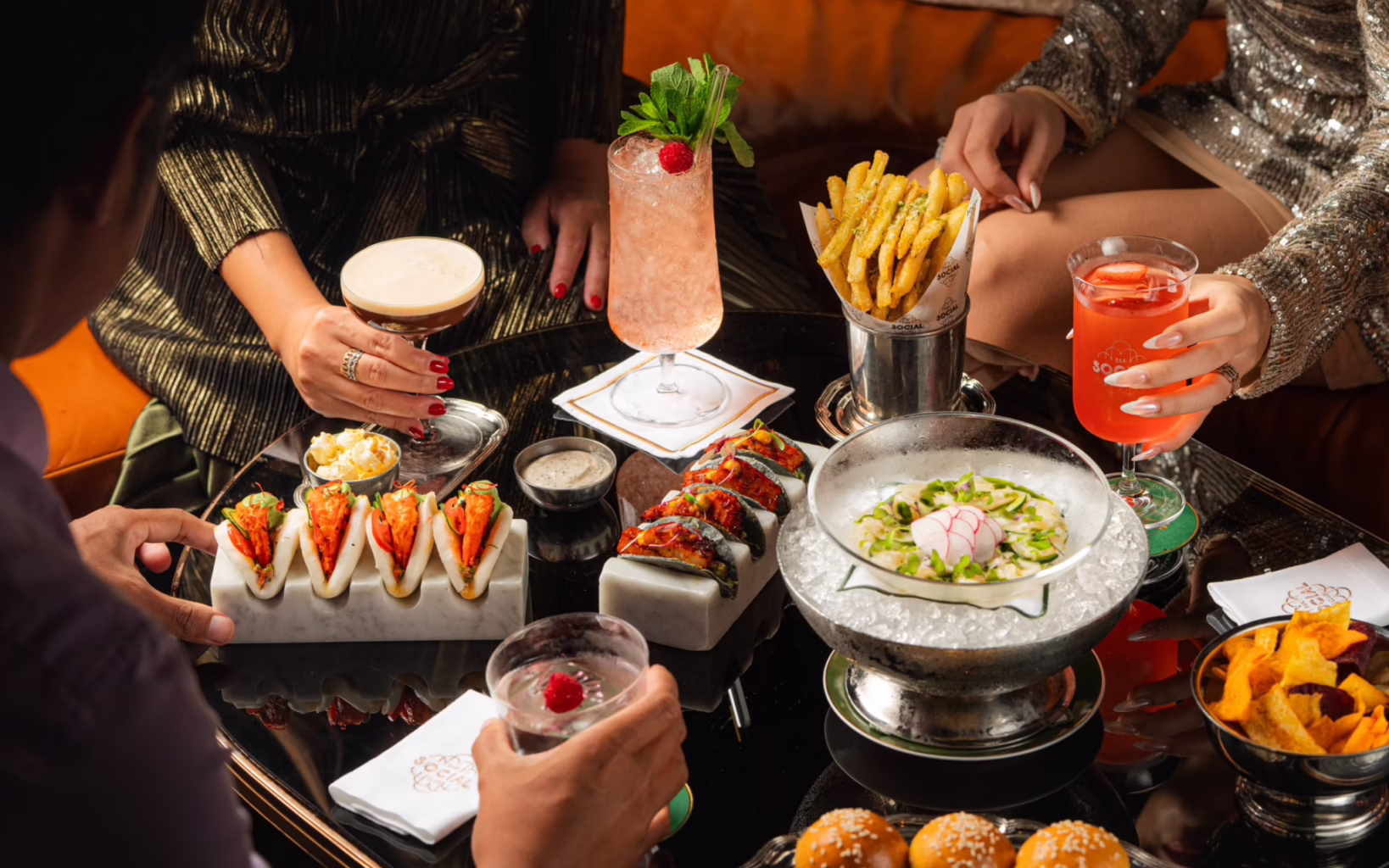 Pair your cocktails with a delectable selection of bar bites at BKK Social Club