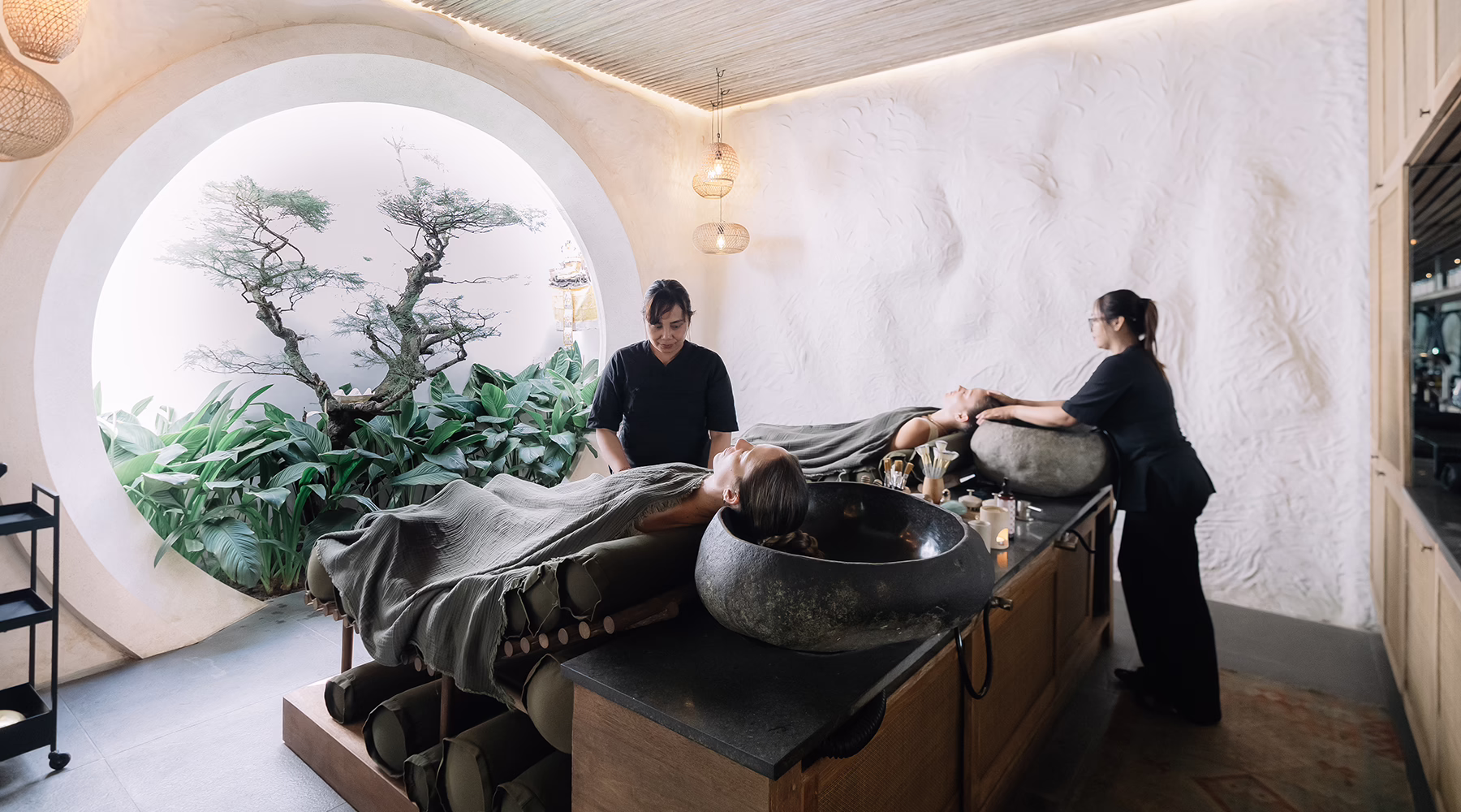 Guests receiving head and scalp treatments at SHOSAN Holistic Spa in Bali