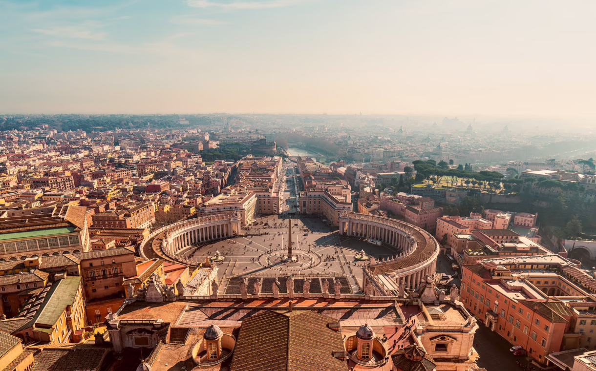 Vatican City skyline with the dome of St. Peter’s Basilica rising above Rome