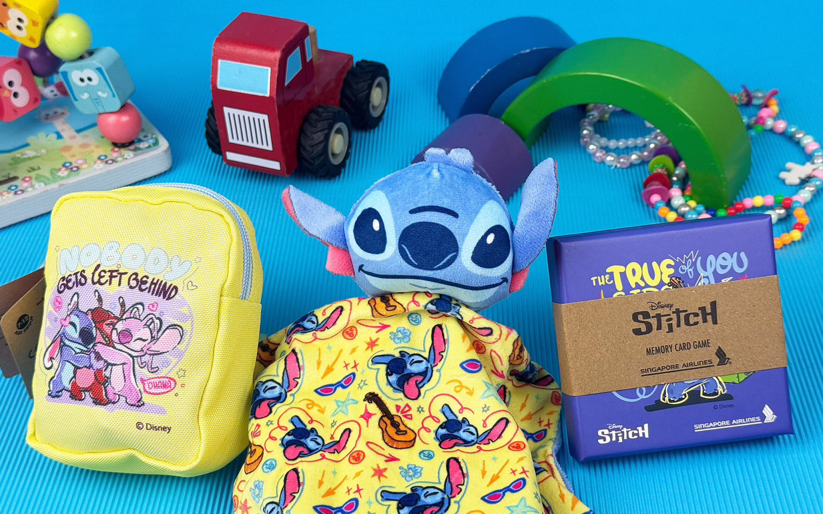 Singapore Airlines children’s amenities featuring Disney’s Stitch