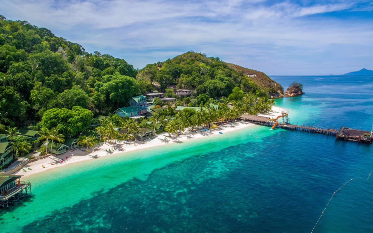 White-sand beachfront and clear blue waters at Rawa Island Resort in Johor, Malaysia