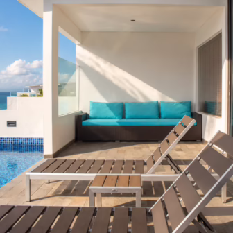 Private pool and sun loungers on the terrace of a studio at Montigo Resorts Nongsa in Batam, overlooking the Singapore Strait.