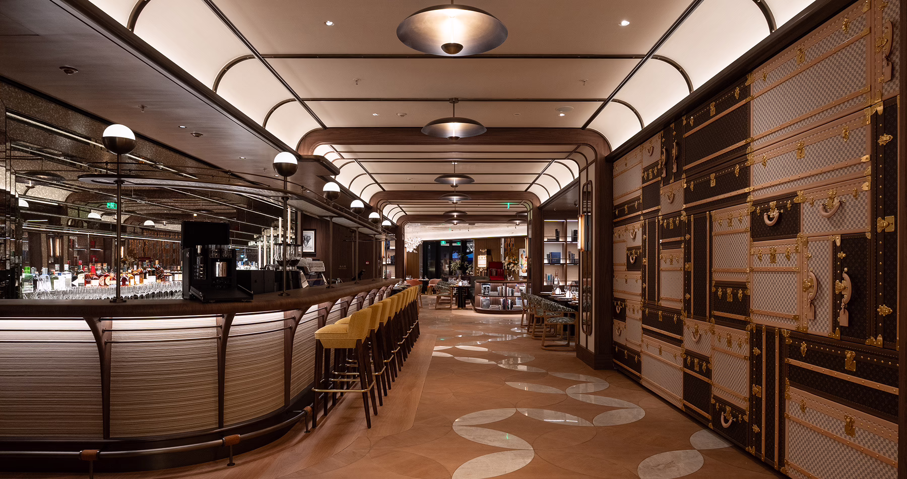 Interior of Le Café Louis Vuitton Shanghai, featuring design details inspired by the house’s historic trunks.