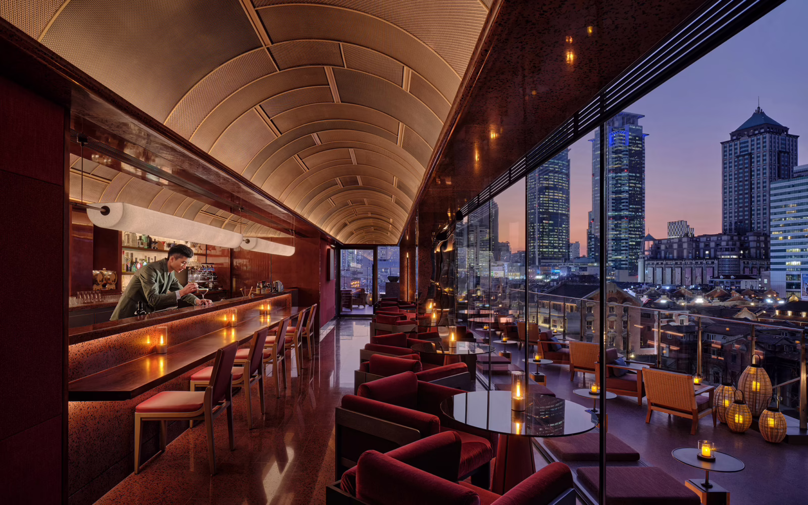 Secret Roof terrace in Shanghai overlooking the historic shikumen rooftops of Zhang Yuan and Jing’an skyline.