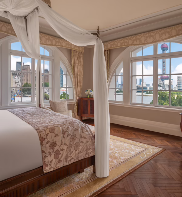 Bund Heritage River View Suite at Waldorf Astoria Shanghai on the Bund, featuring elegant heritage interiors and views of the Huangpu River.